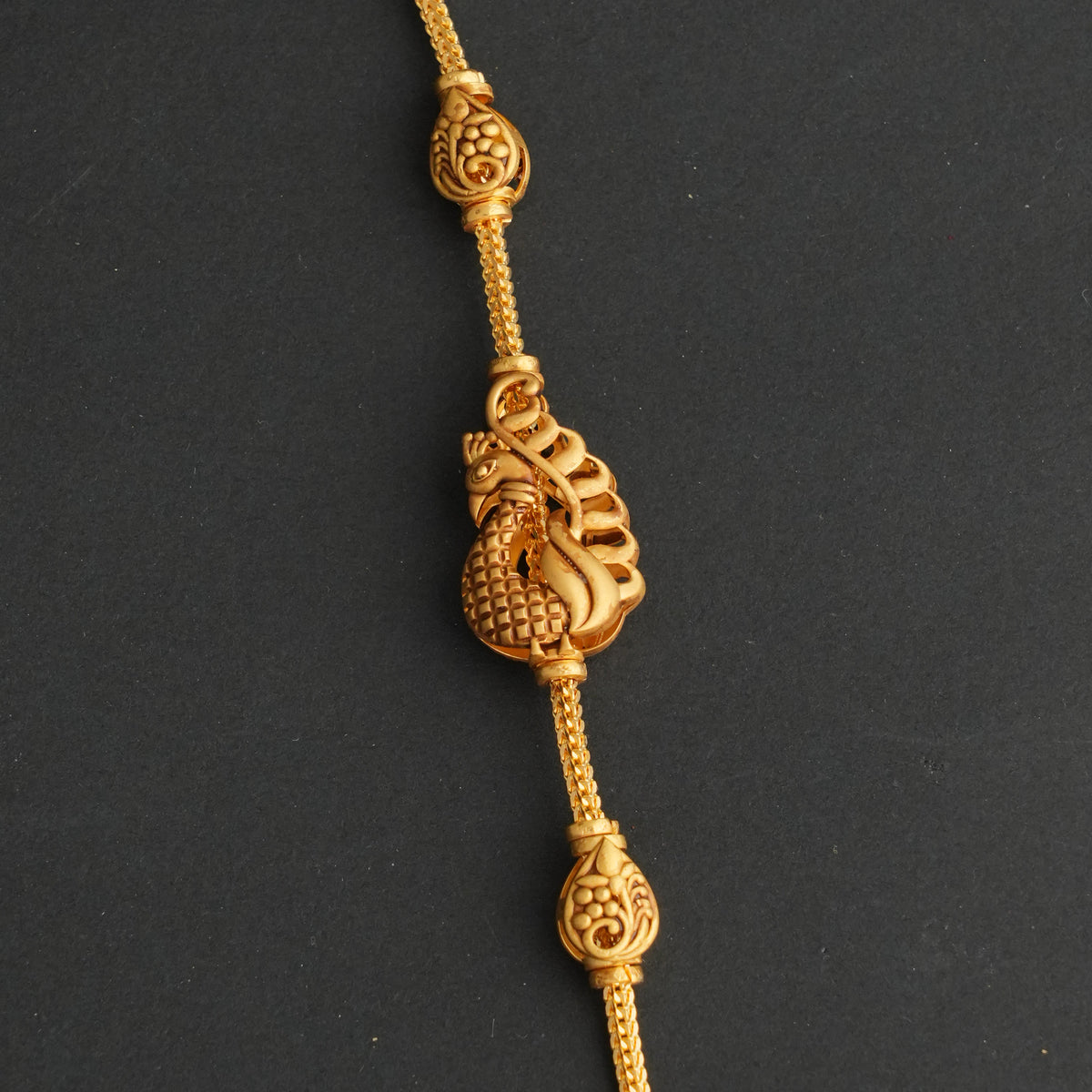 Grace Mugappu Chain