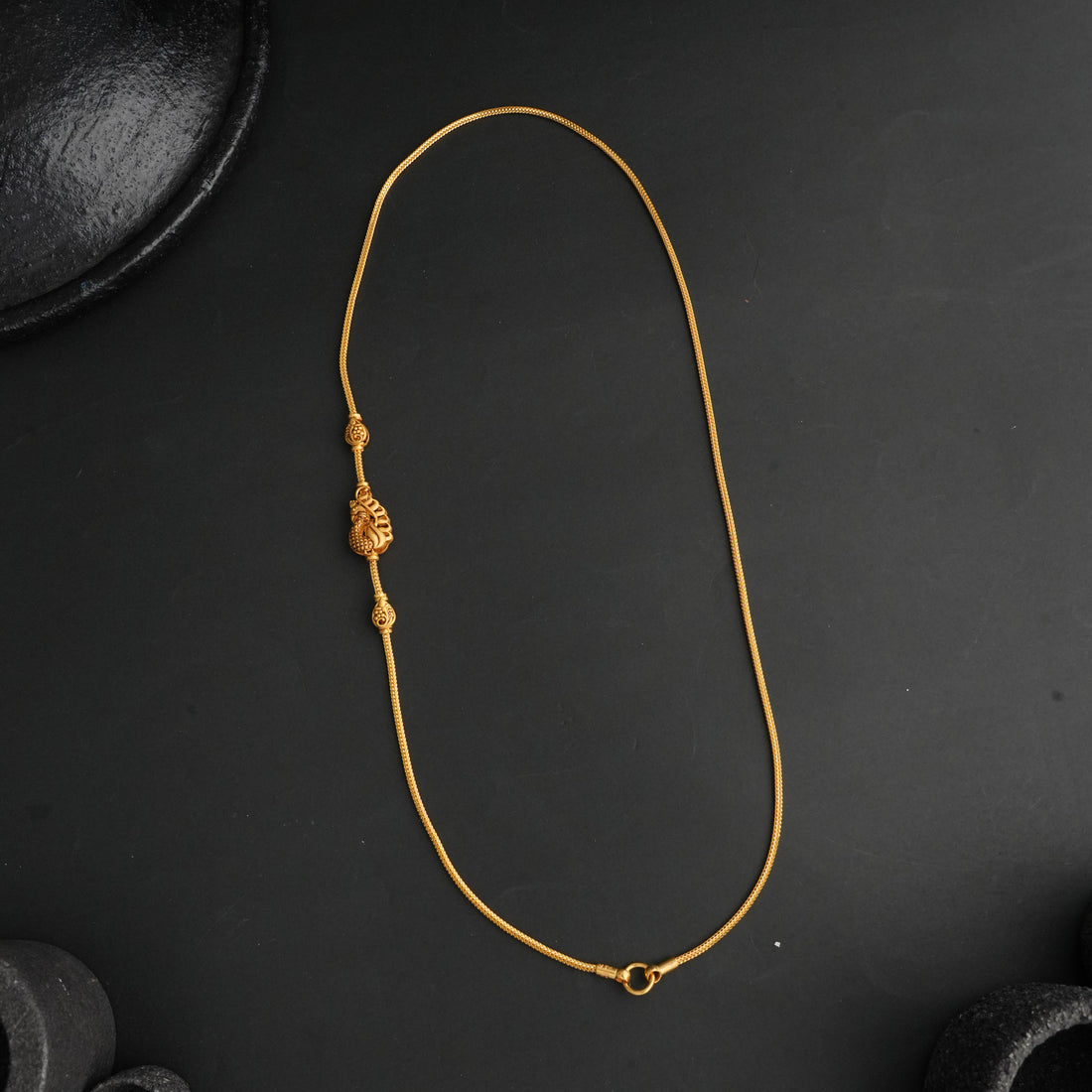 Grace Mugappu Chain
