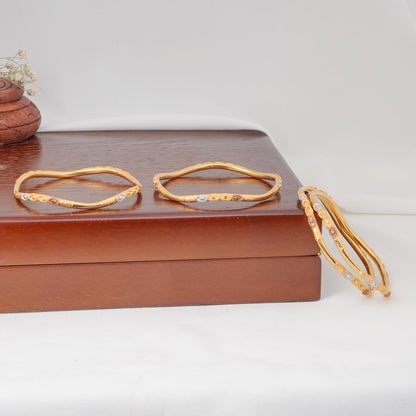 Shine Twist Gold Bangles