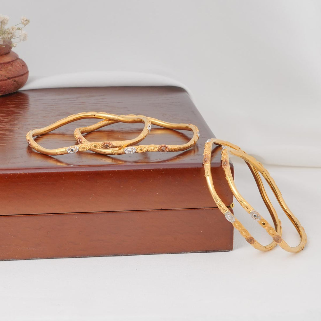 Shine Twist Gold Bangles